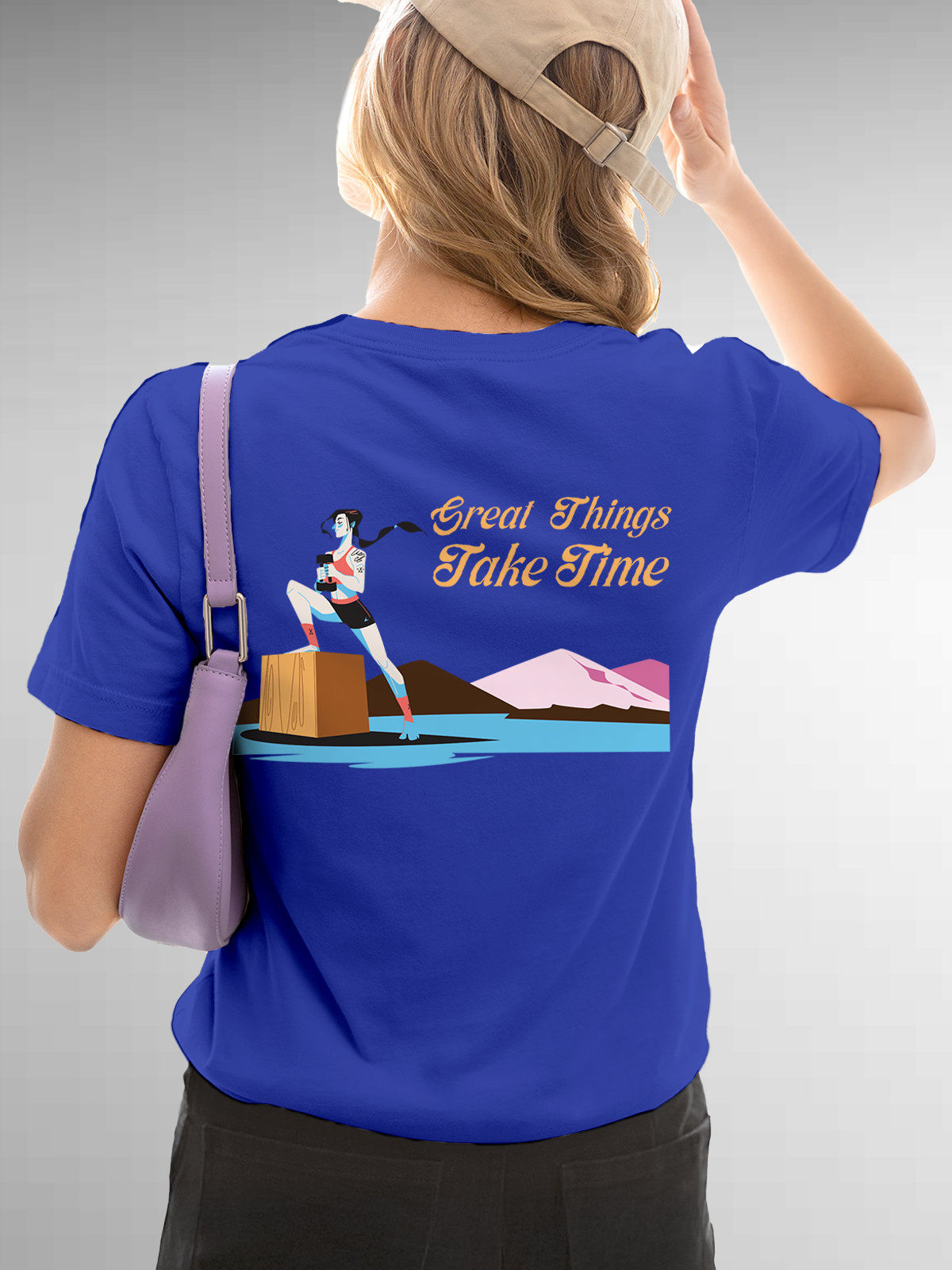 Model wearing Women's Blue Round Neck T-shirt with 'Great Things Take Time' design, offering effortless style and premium comfort