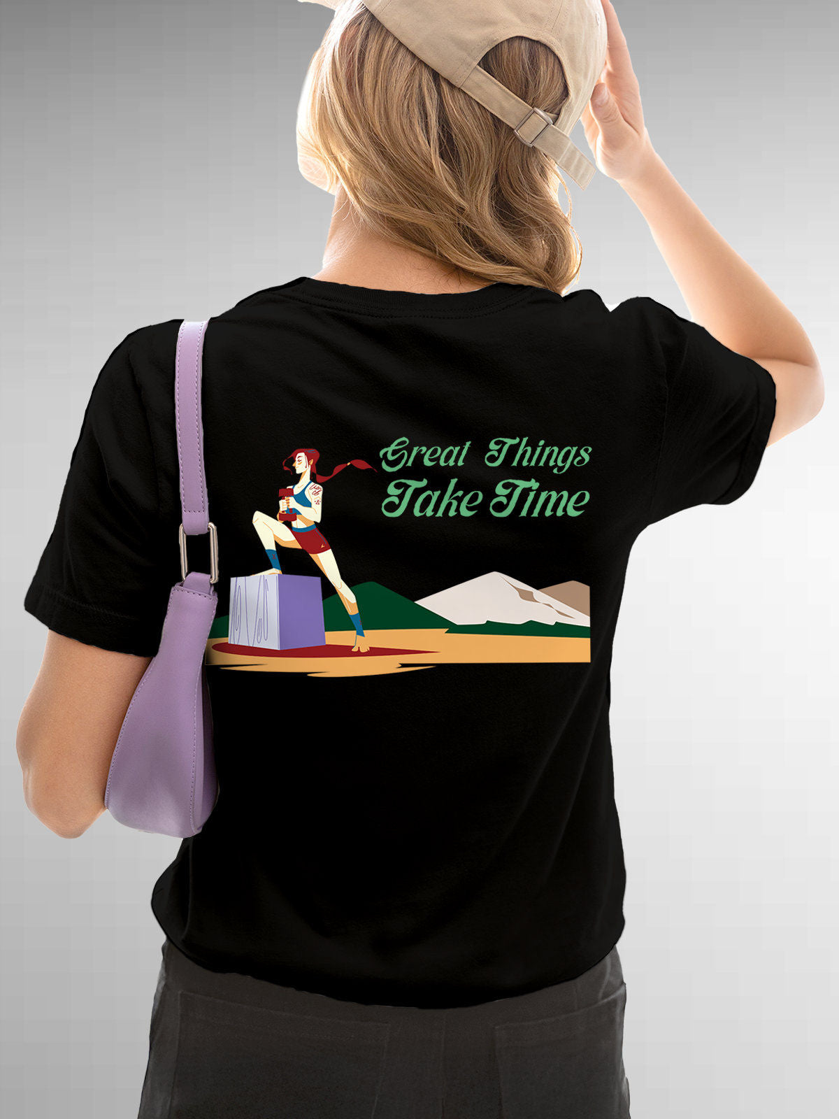 Model wearing Women's Black Round Neck T-shirt with 'Great Things Take Time' design, offering effortless style and premium comfort