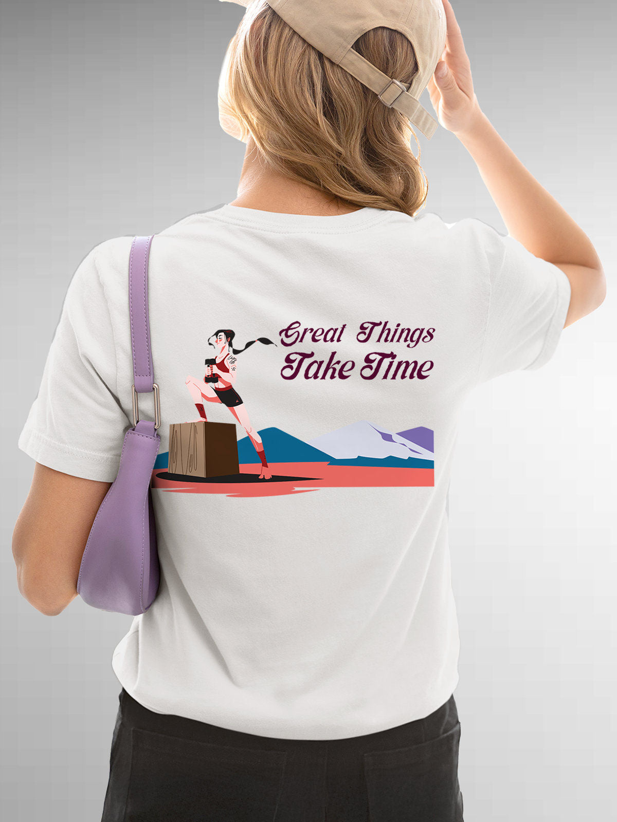 Model wearing Women's White Round Neck T-shirt with 'Great Things Take Time' design, offering effortless style and premium comfort