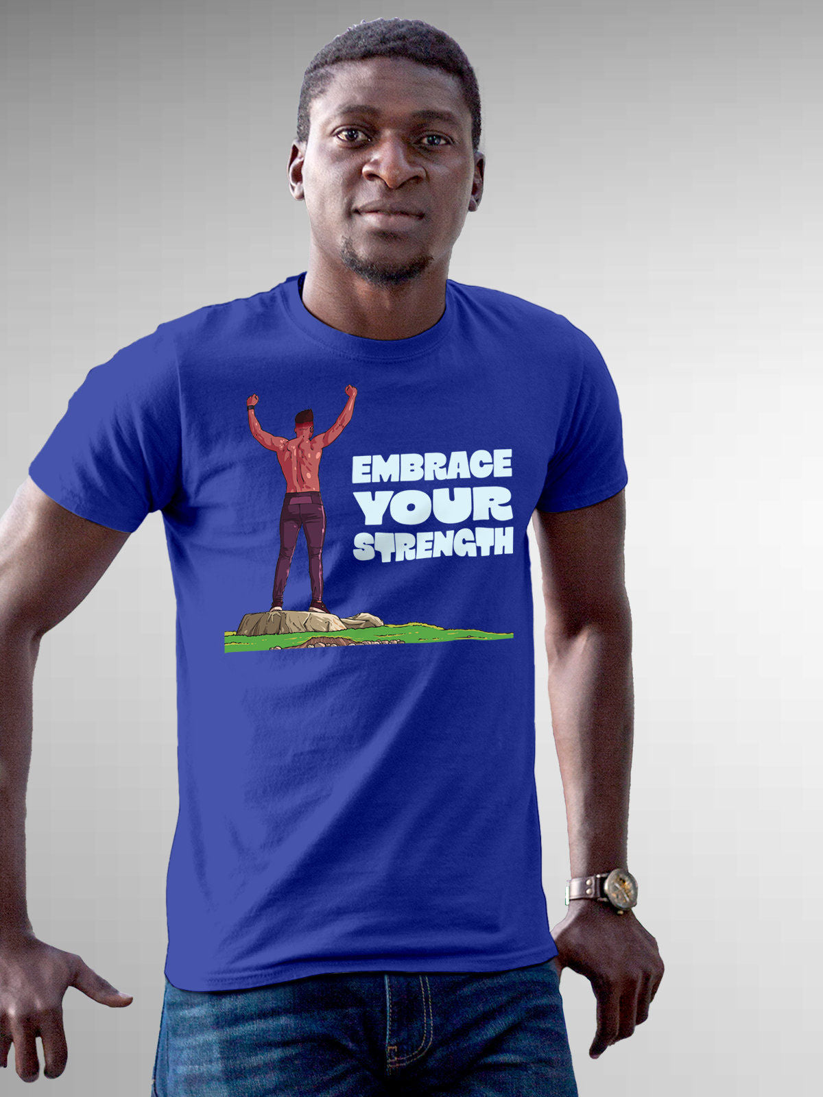 Model wearing Men's Blue Round Neck T-shirt with 'Embrace Your Strength' design, offering effortless style and premium comfort