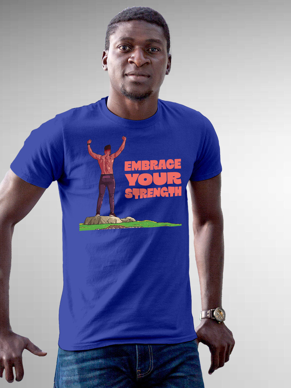 Model wearing Men's Blue Round Neck T-shirt with 'Embrace Your Strength' design, offering effortless style and premium comfort