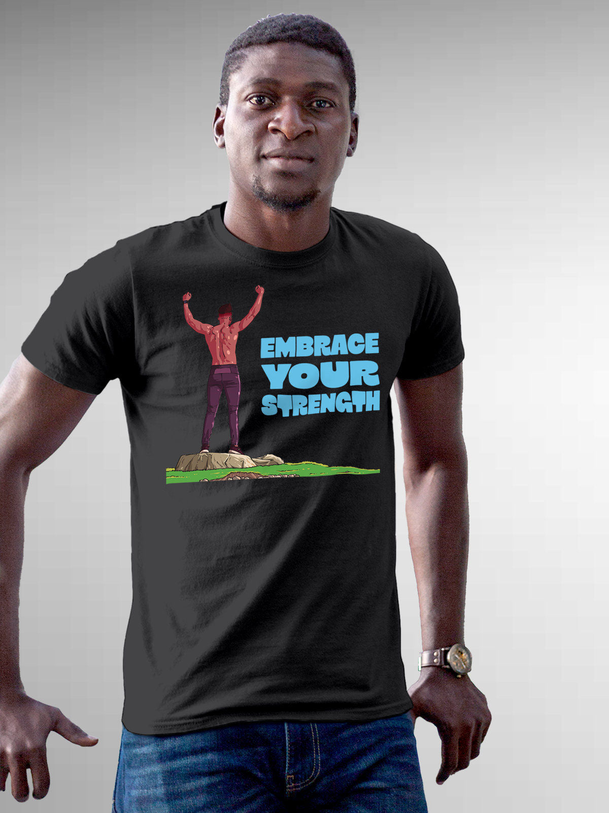 Model wearing Men's Dark Grey Round Neck T-shirt with 'Embrace Your Strength' design, offering effortless style and premium comfort