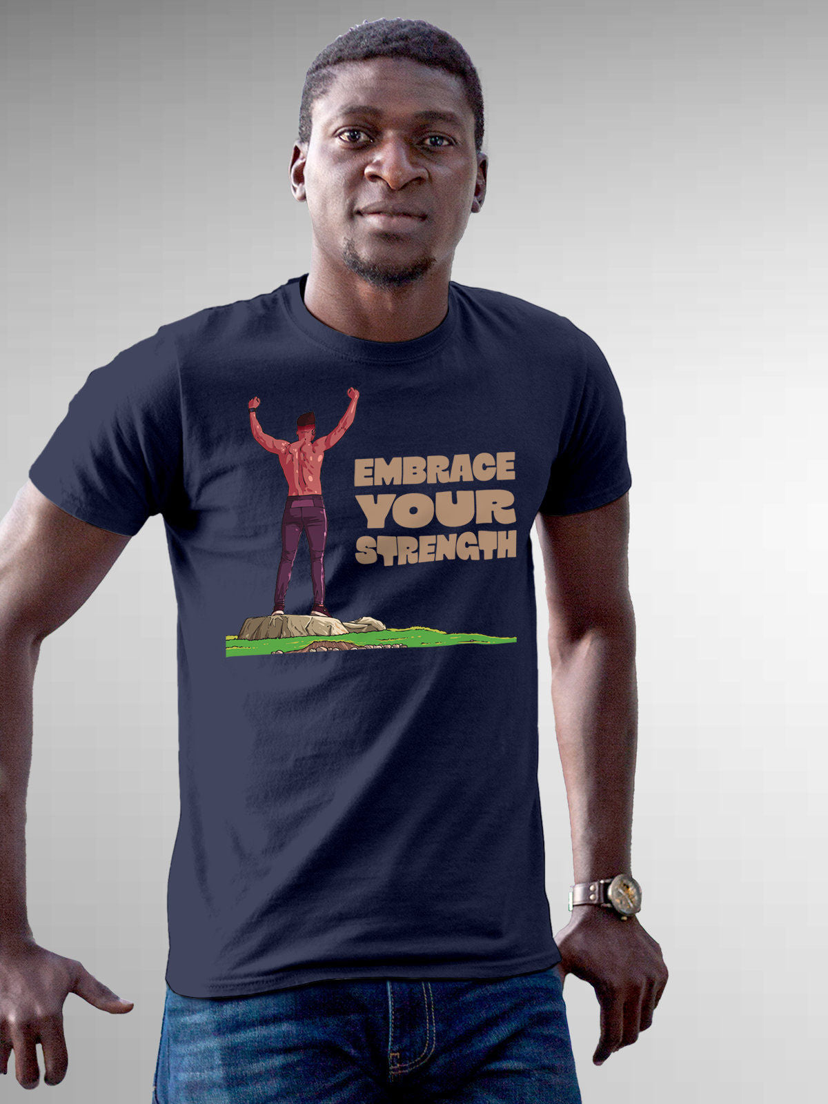 Model wearing Men's Navy Blue Round Neck T-shirt with 'Embrace Your Strength' design, offering effortless style and premium comfort