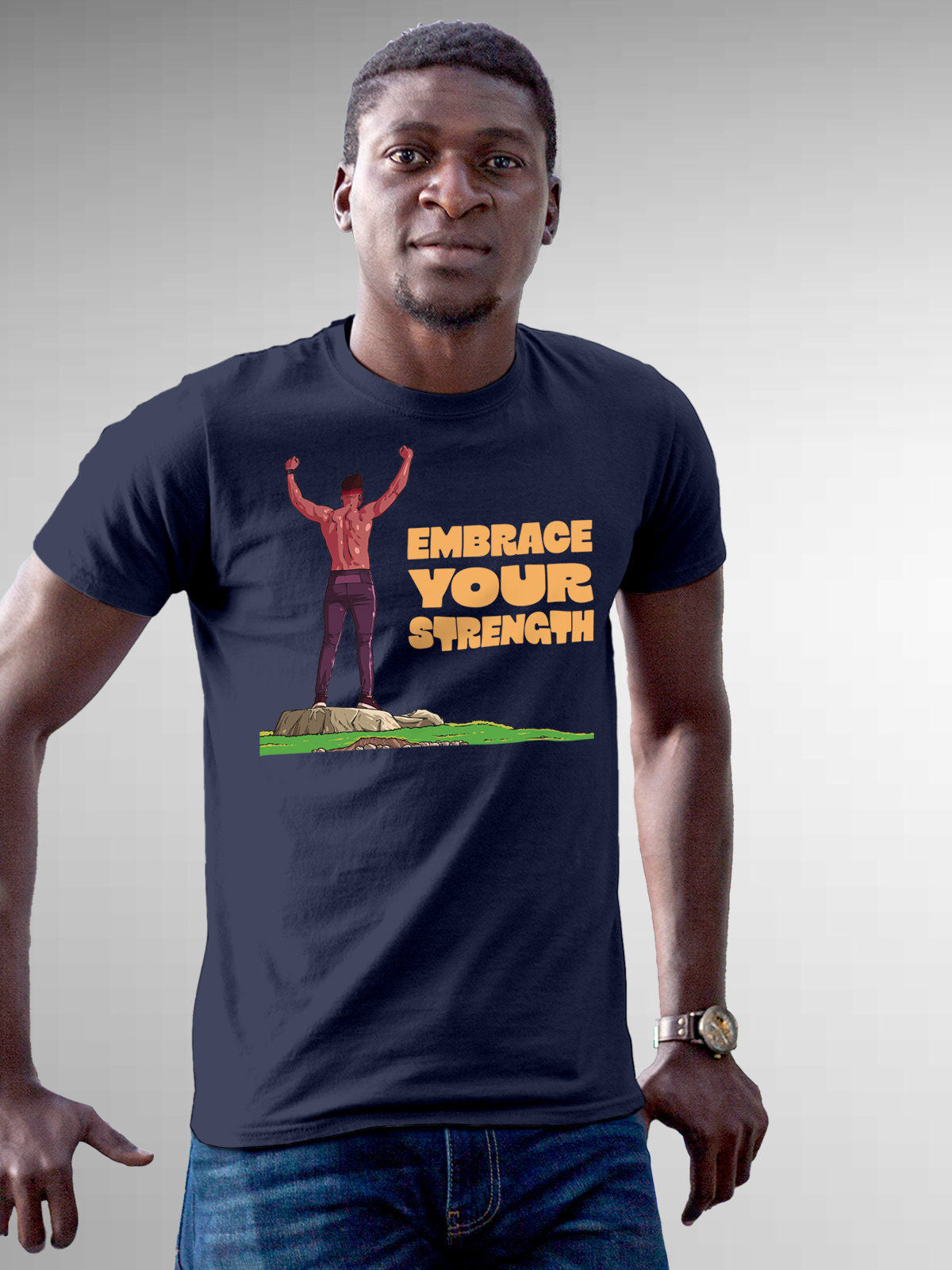 Model wearing Men's Navy Blue Round Neck T-shirt with 'Embrace Your Strength' design, offering effortless style and premium comfort