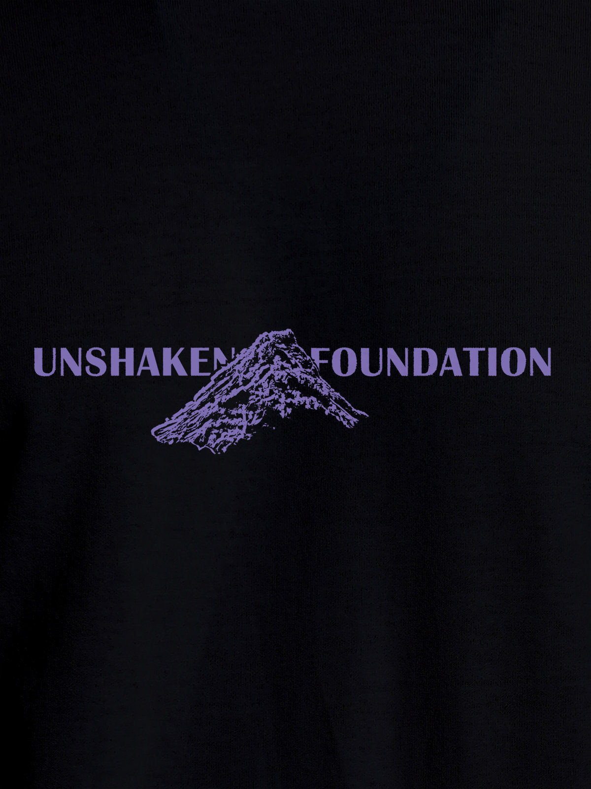 Close up of 'Unshaken Foundation' design on Women's Black Round Neck T-shirt, highlighting intricate details and vibrant print.