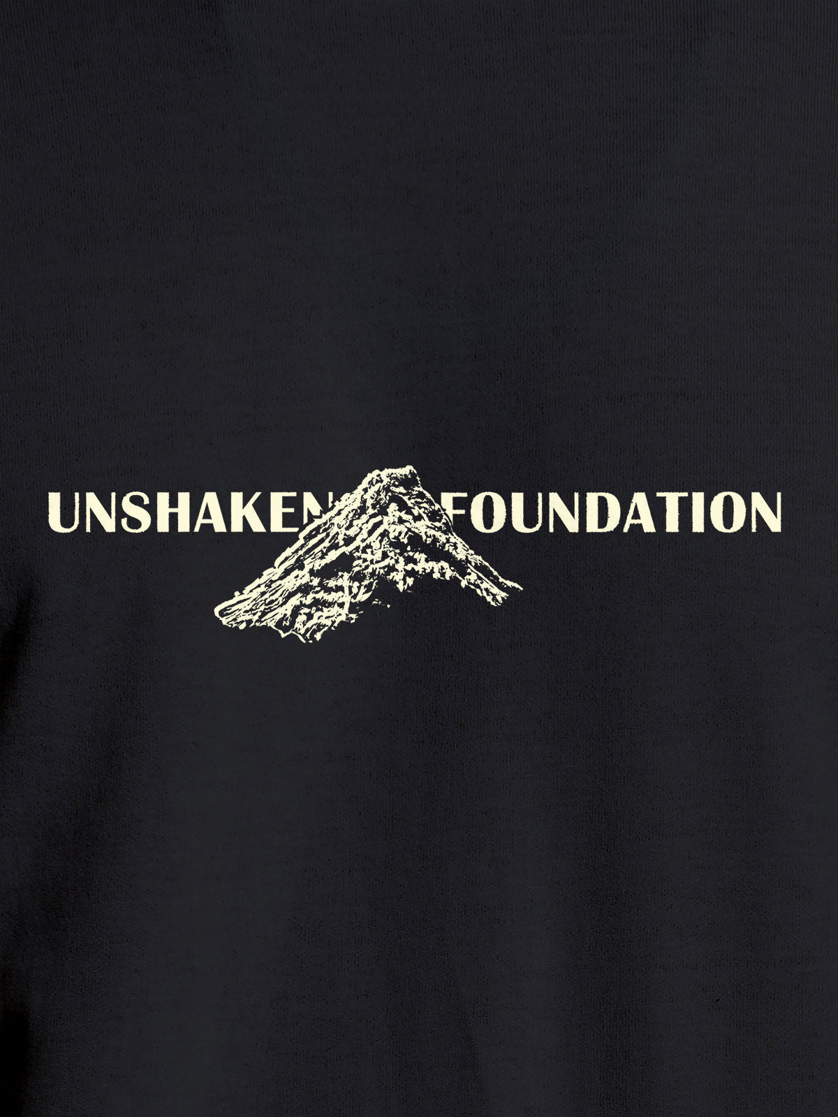 Close up of 'Unshaken Foundation' design on Women's Dark Grey Round Neck T-shirt, highlighting intricate details and vibrant print.