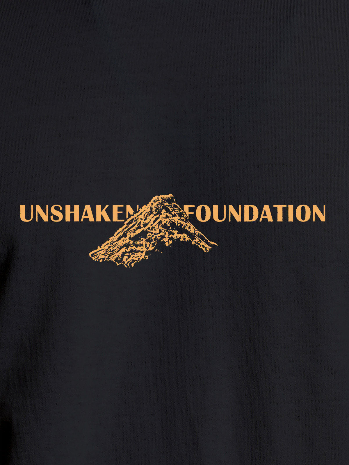 Close up of 'Unshaken Foundation' design on Women's Dark Grey Round Neck T-shirt, highlighting intricate details and vibrant print.