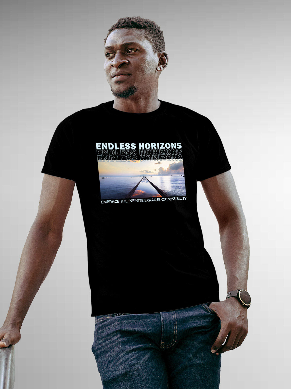 Model wearing Men's Black Round Neck T-shirt with 'Endless Horizons' design, offering effortless style and premium comfort