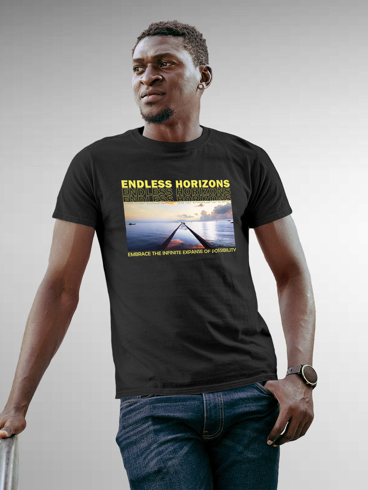 Model wearing Men's Dark Grey Round Neck T-shirt with 'Endless Horizons' design, offering effortless style and premium comfort