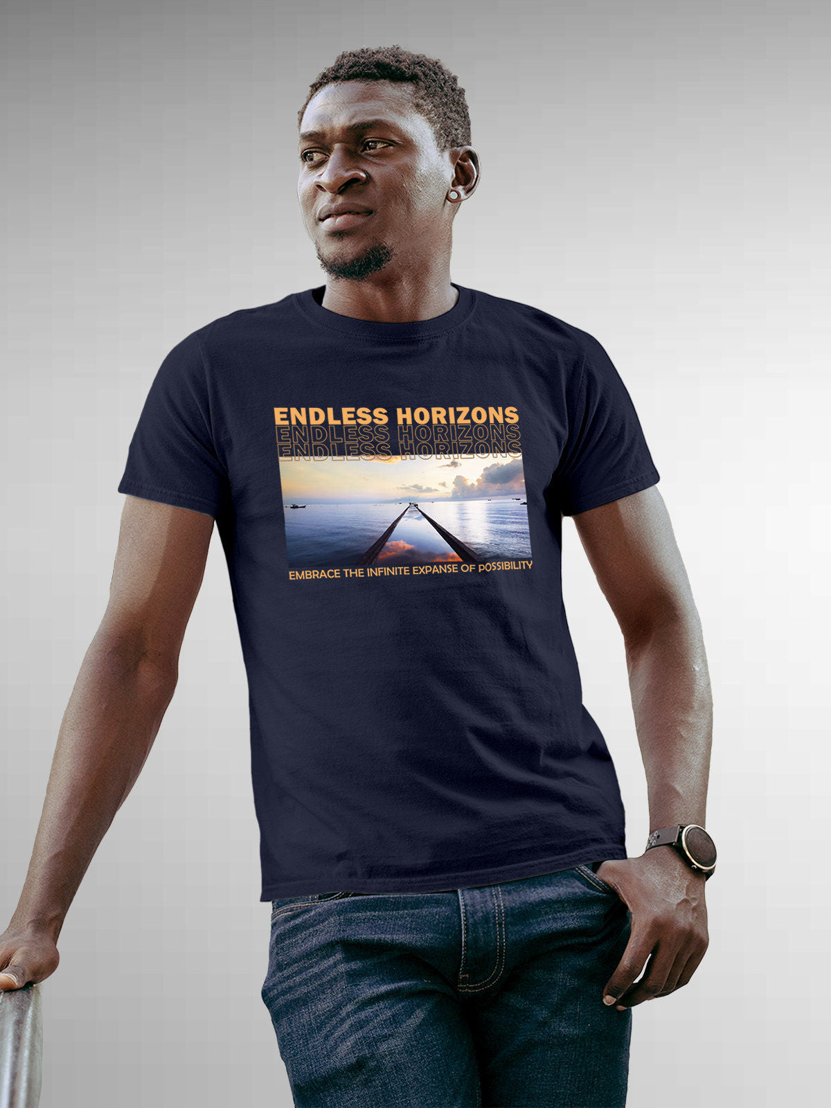 Model wearing Men's Navy Blue Round Neck T-shirt with 'Endless Horizons' design, offering effortless style and premium comfort