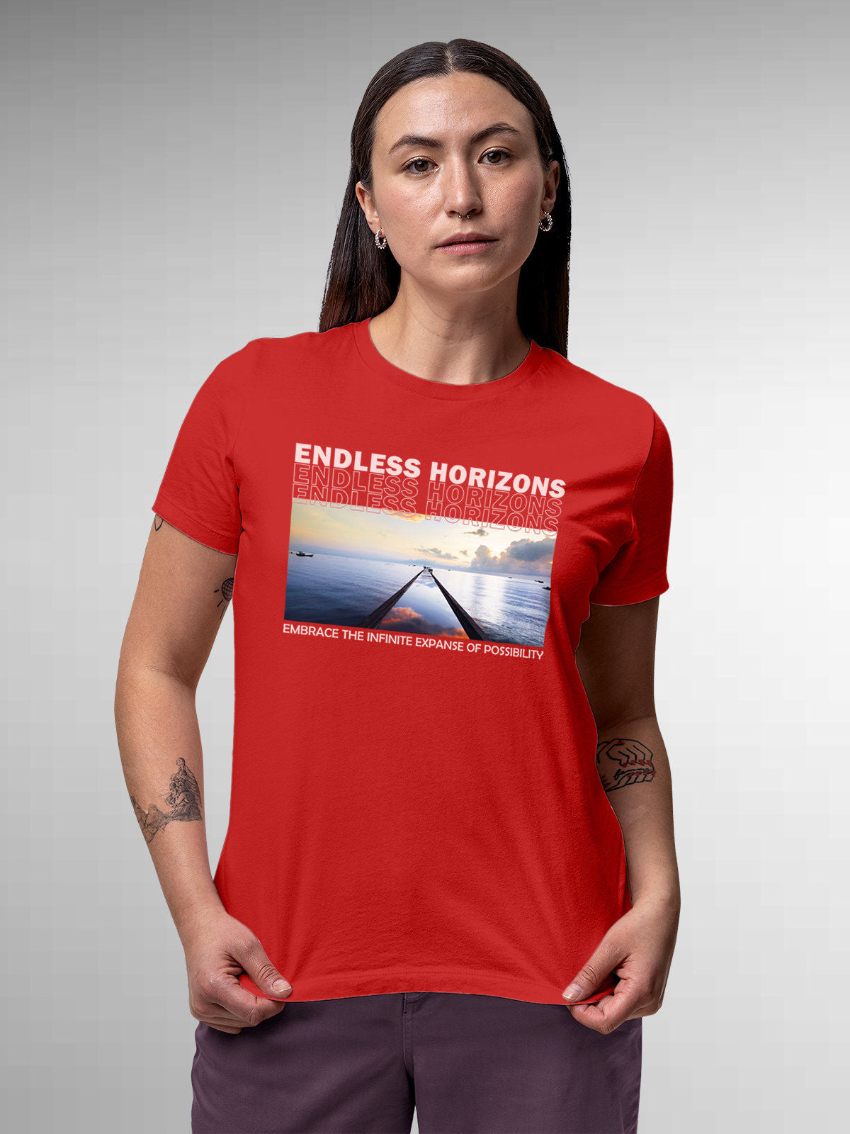 Model wearing Women's Red Round Neck T-shirt with 'Endless Horizons' design, offering effortless style and premium comfort