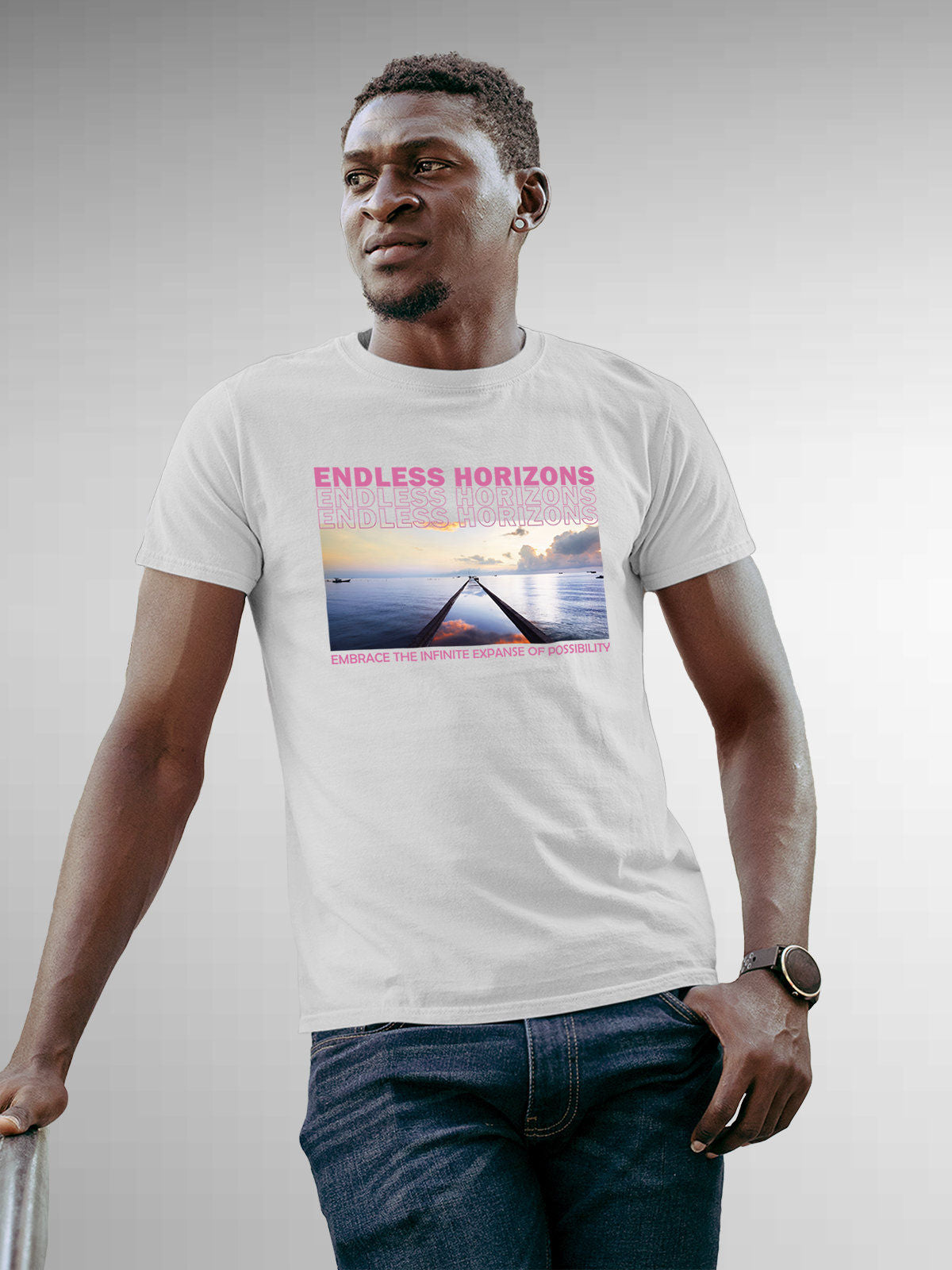 Model wearing Men's White Round Neck T-shirt with 'Endless Horizons' design, offering effortless style and premium comfort