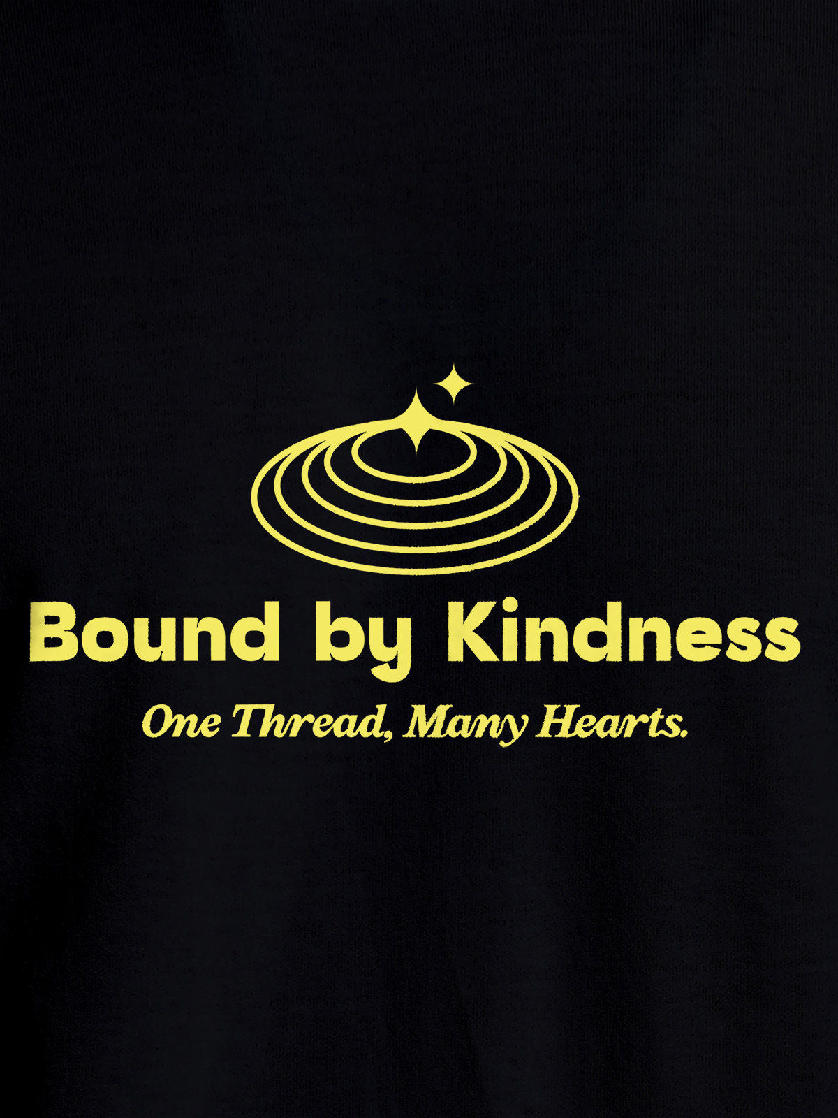 Close up of 'Bound By Kindness' design on Women's Black Round Neck T-shirt, highlighting intricate details and vibrant print.