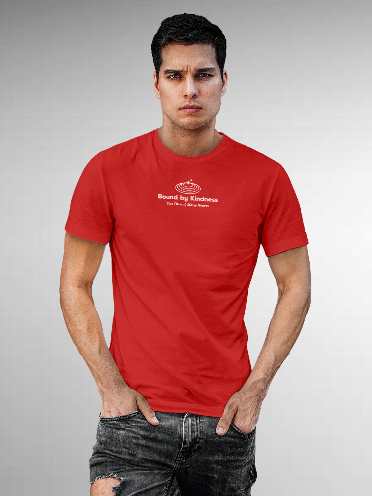 Model wearing Men's Red Round Neck T-shirt with 'Bound By Kindness' design, offering effortless style and premium comfort