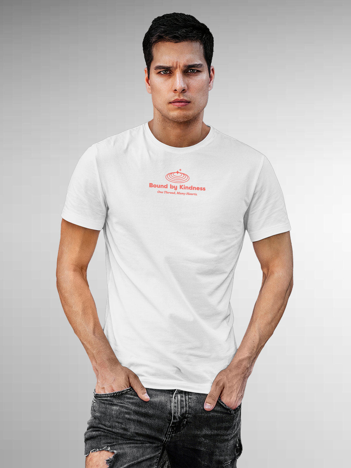 Model wearing Men's White Round Neck T-shirt with 'Bound By Kindness' design, offering effortless style and premium comfort