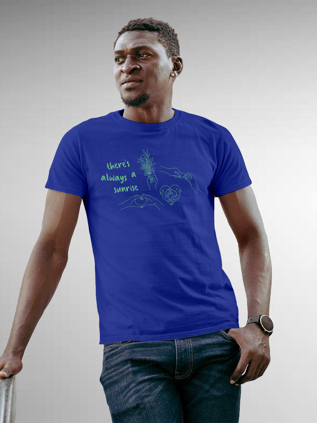 Model wearing Men's Blue Round Neck T-shirt with 'There's Always a Sunrise' design, offering effortless style and premium comfort