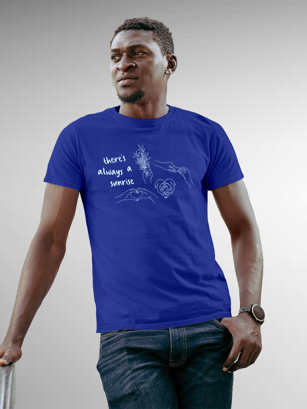 Model wearing Men's Blue Round Neck T-shirt with 'There's Always a Sunrise' design, offering effortless style and premium comfort