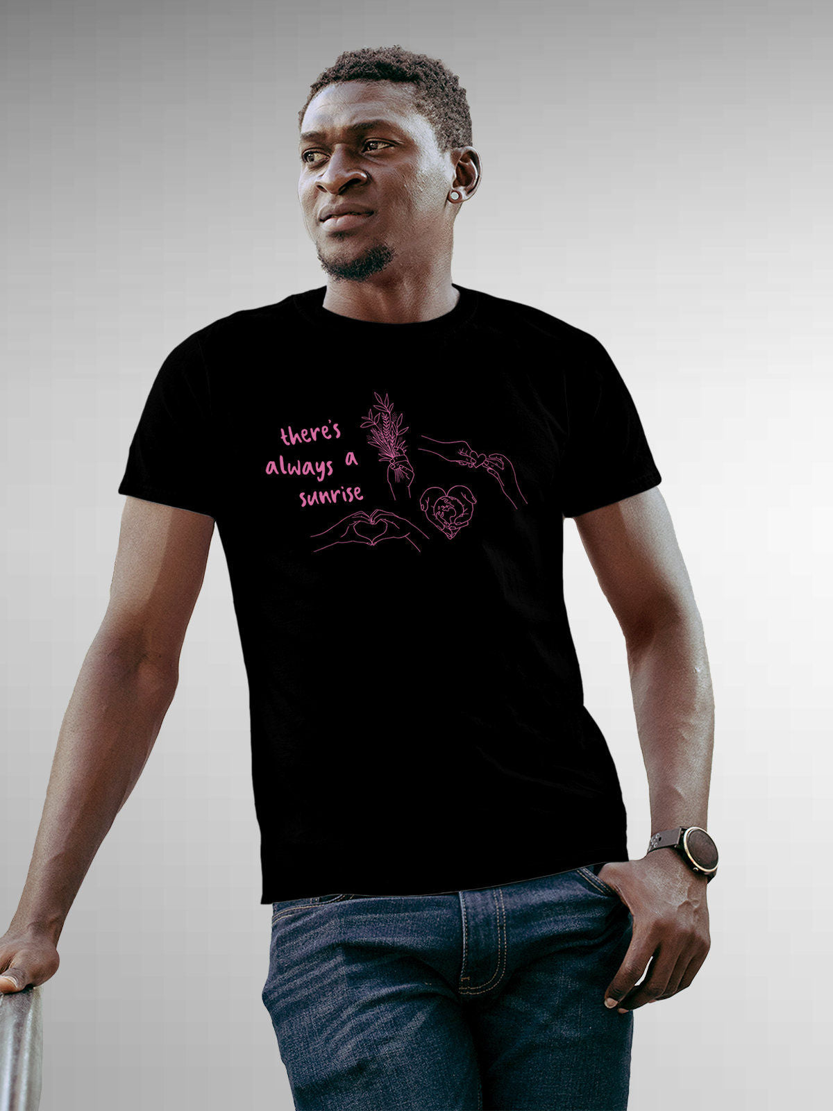 Model wearing Men's Black Round Neck T-shirt with 'There's Always a Sunrise' design, offering effortless style and premium comfort