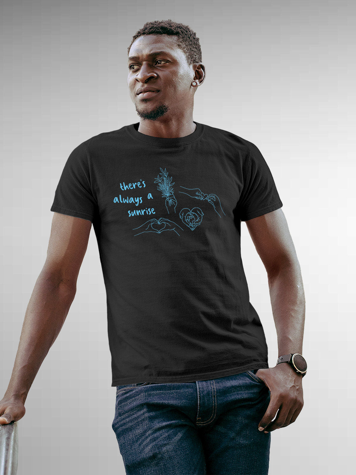 Model wearing Men's Dark Grey Round Neck T-shirt with 'There's Always a Sunrise' design, offering effortless style and premium comfort