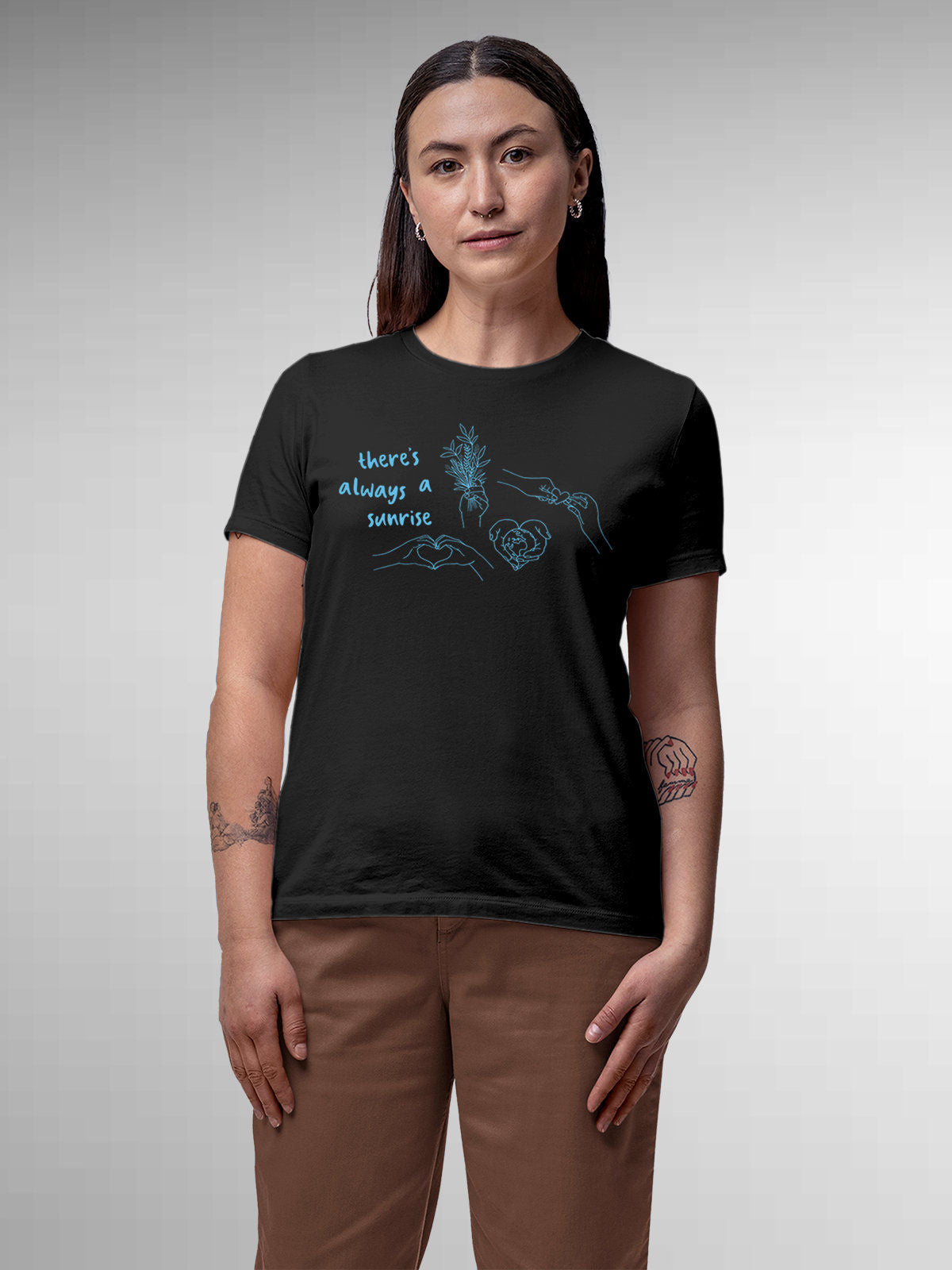 Model wearing Women's Dark Grey Round Neck T-shirt with 'There's Always a Sunrise' design, offering effortless style and premium comfort