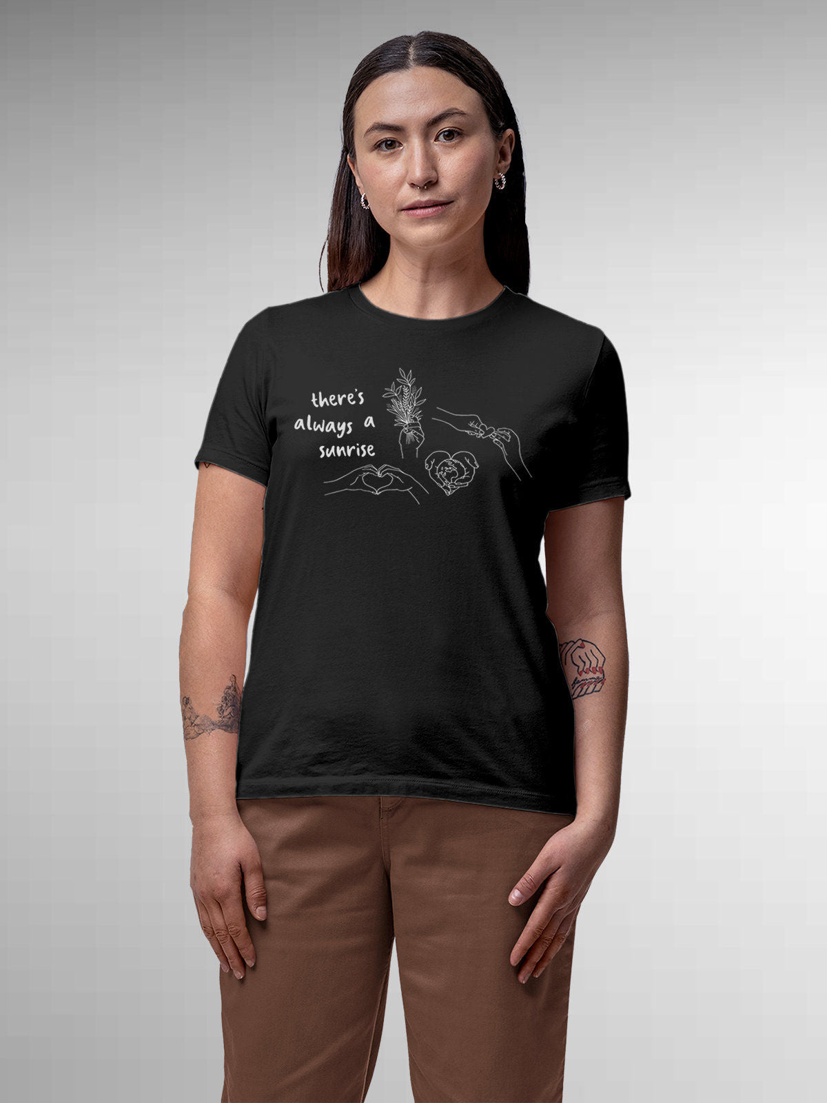 Model wearing Women's Dark Grey Round Neck T-shirt with 'There's Always a Sunrise' design, offering effortless style and premium comfort