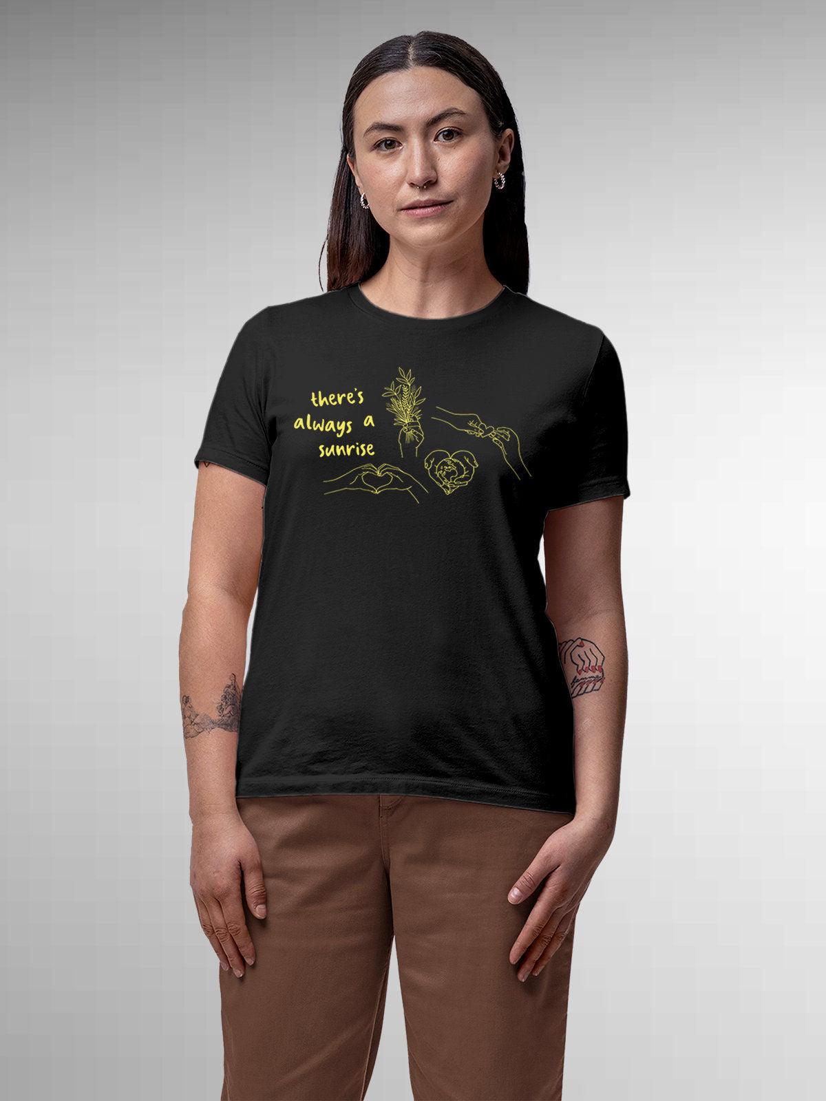 Model wearing Women's Dark Grey Round Neck T-shirt with 'There's Always a Sunrise' design, offering effortless style and premium comfort