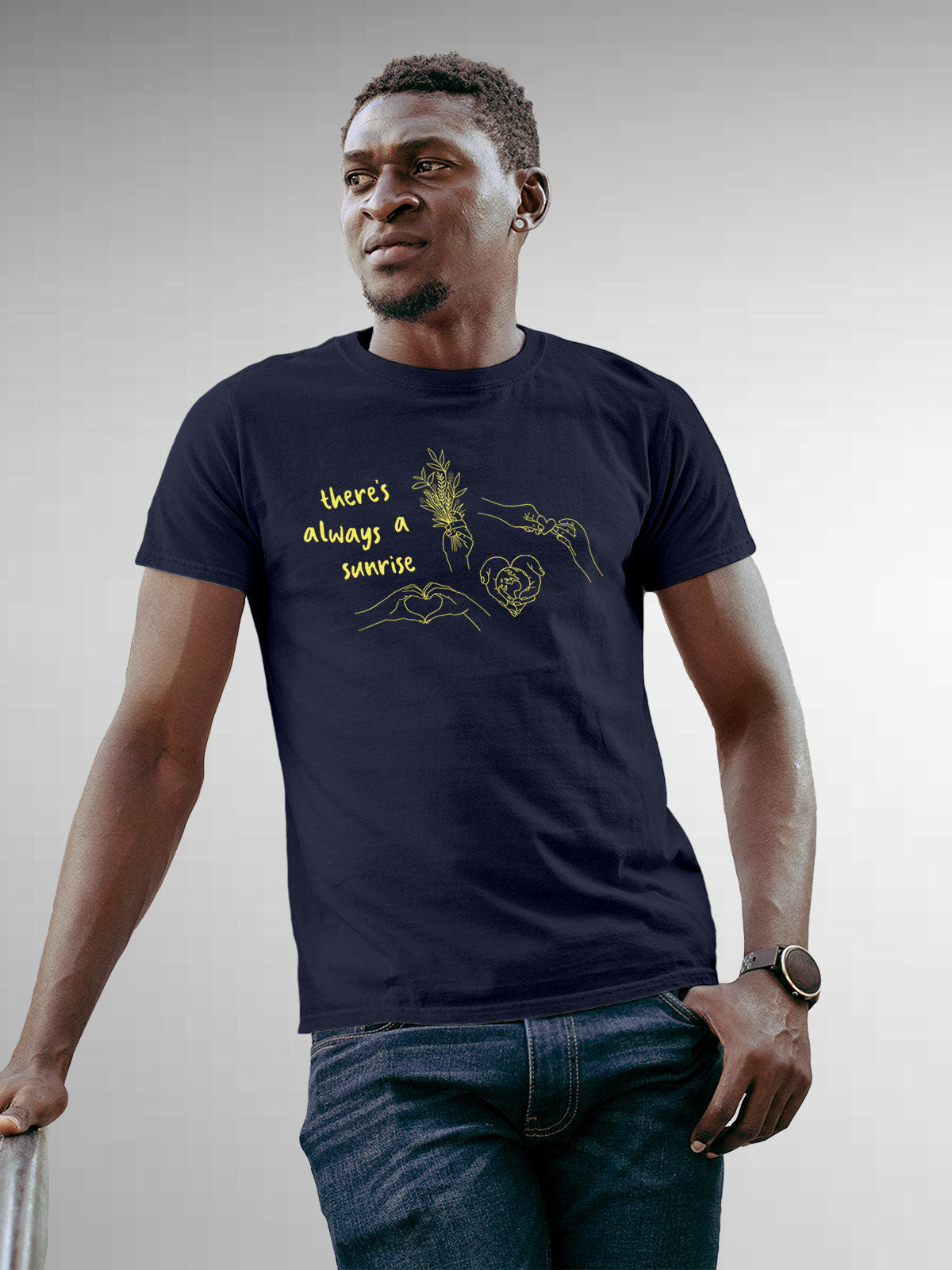 Model wearing Men's Navy Blue Round Neck T-shirt with 'There's Always a Sunrise' design, offering effortless style and premium comfort