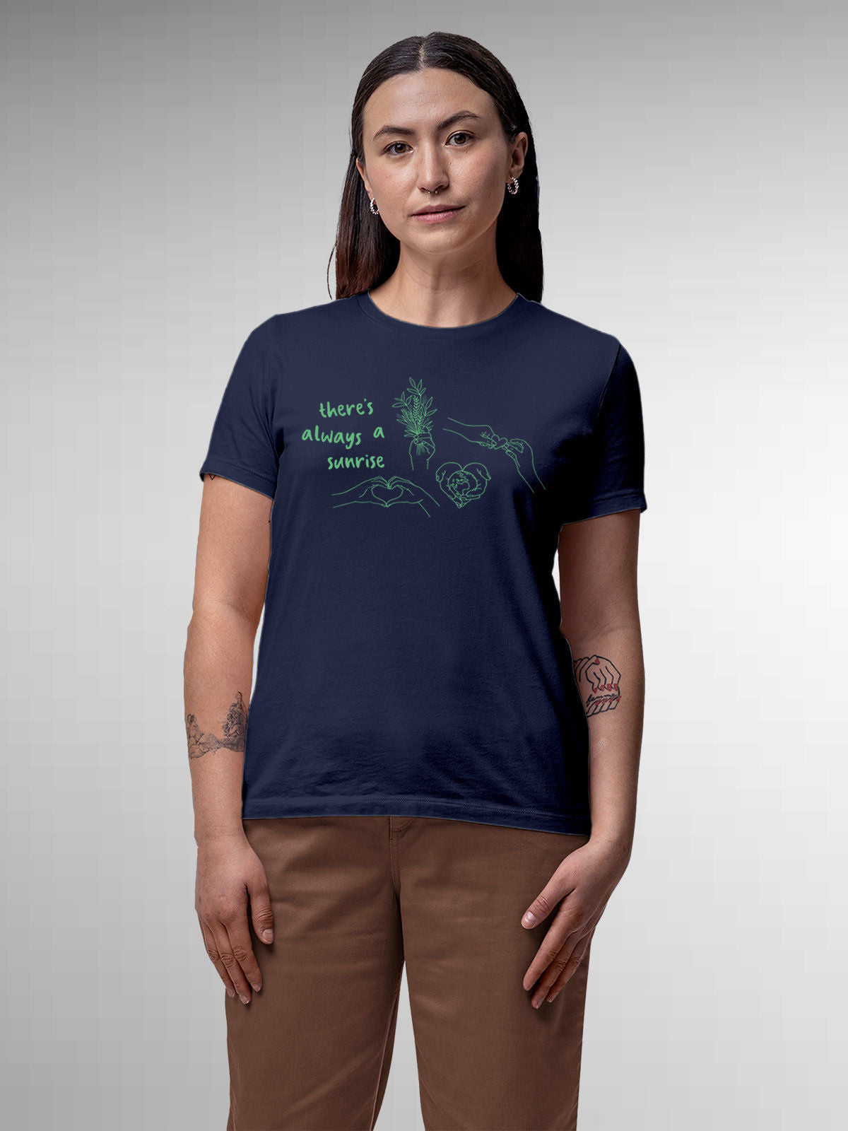 Model wearing Women's Navy Blue Round Neck T-shirt with 'There's Always a Sunrise' design, offering effortless style and premium comfort