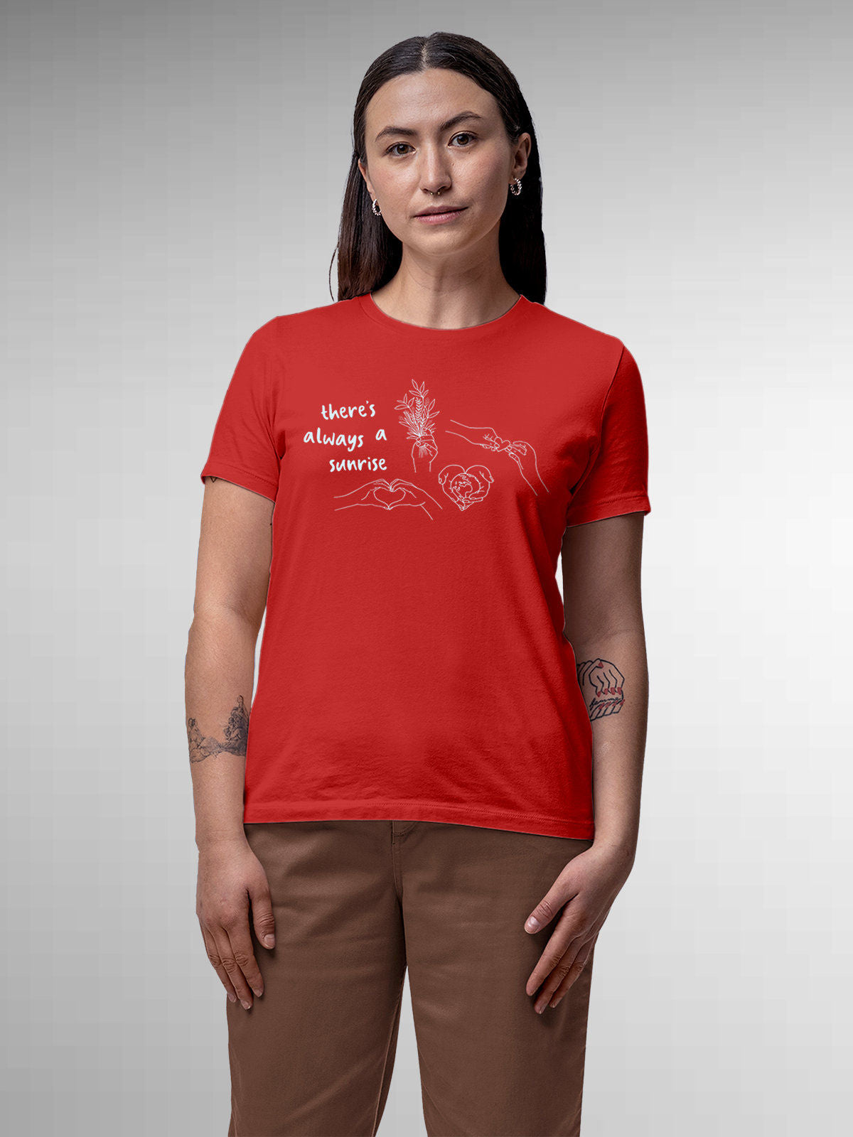 Model wearing Women's Red Round Neck T-shirt with 'There's Always a Sunrise' design, offering effortless style and premium comfort