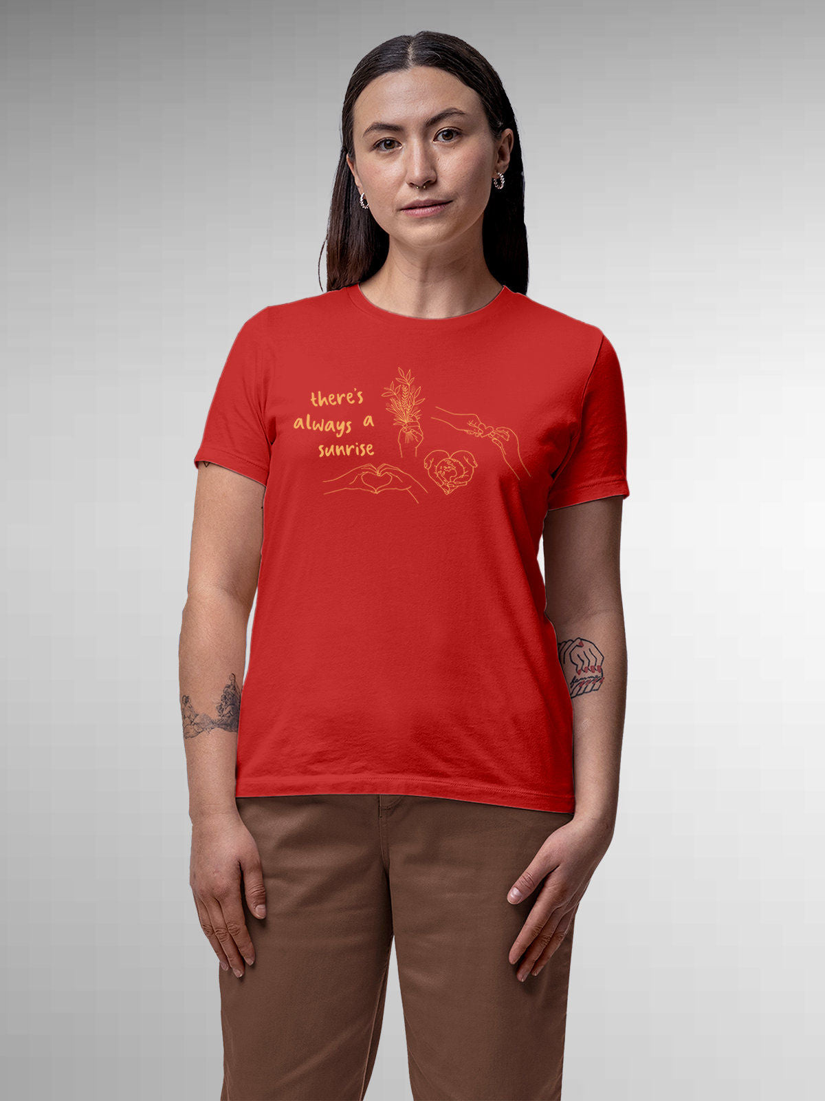 Model wearing Women's Red Round Neck T-shirt with 'There's Always a Sunrise' design, offering effortless style and premium comfort