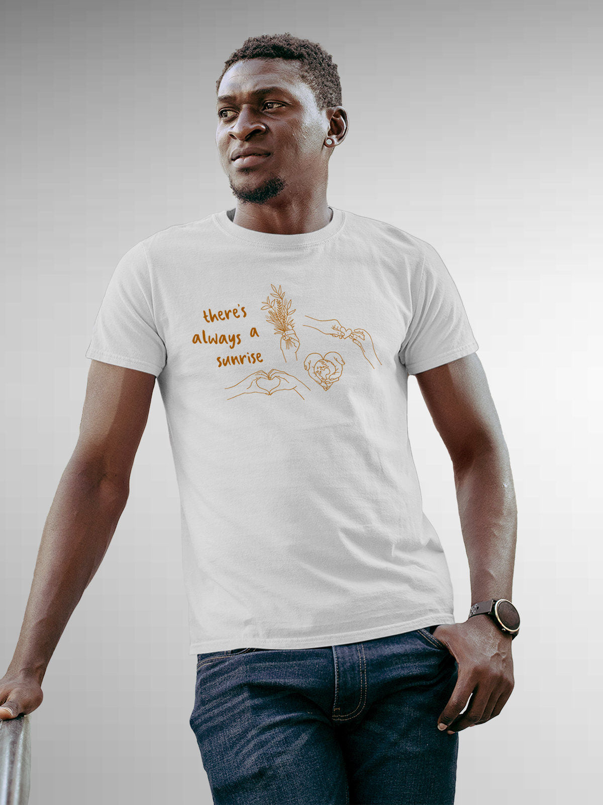 Model wearing Men's White Round Neck T-shirt with 'There's Always a Sunrise' design, offering effortless style and premium comfort