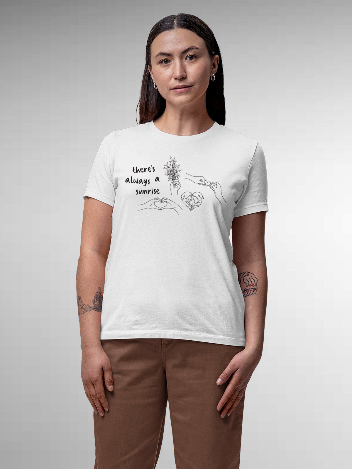 Model wearing Women's White Round Neck T-shirt with 'There's Always a Sunrise' design, offering effortless style and premium comfort