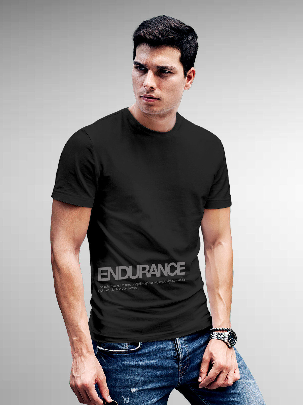 Model wearing Men's Dark Grey Round Neck T-shirt with 'Endurance' design, offering effortless style and premium comfort