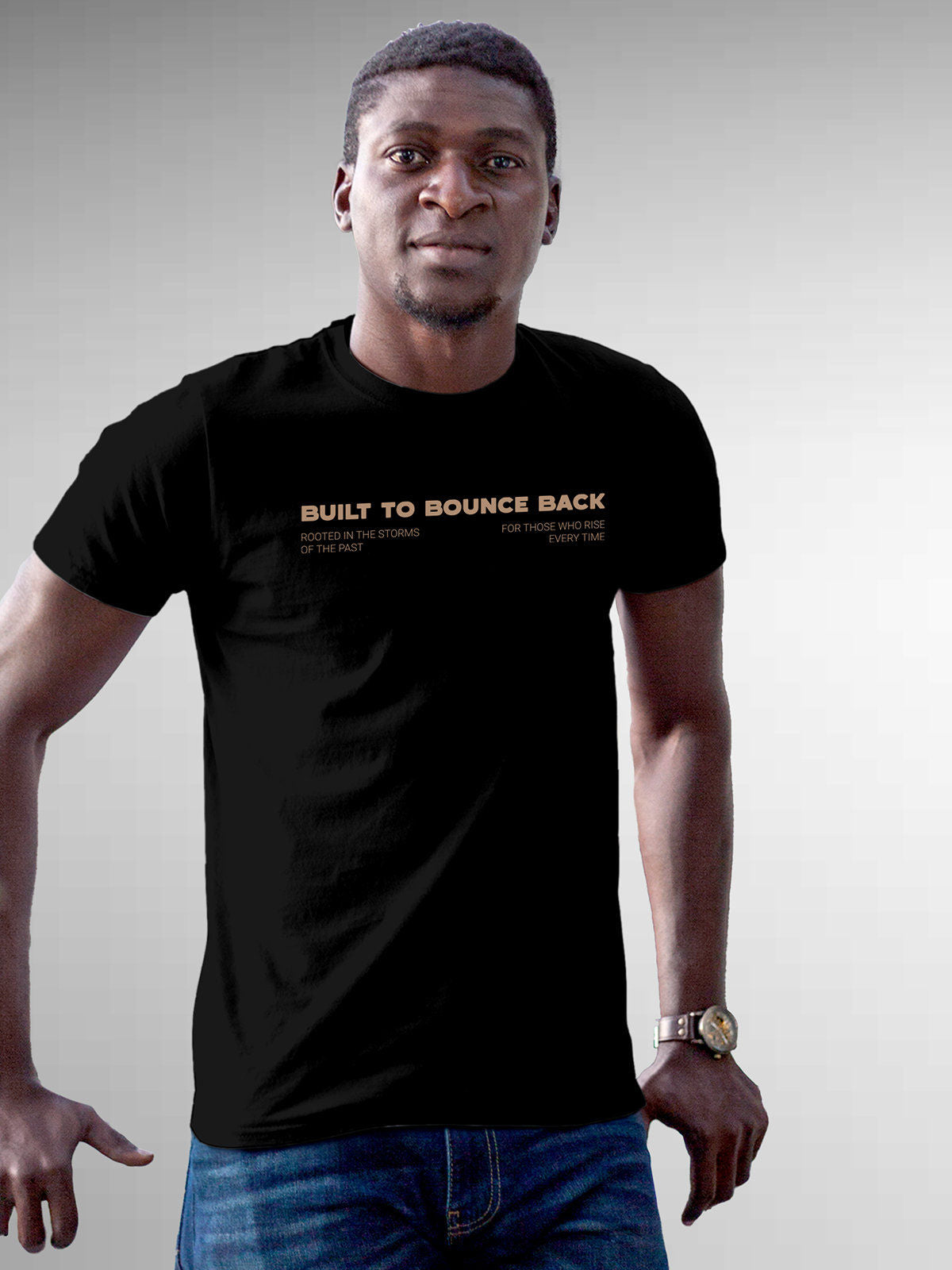 Model wearing Men's Black Round Neck T-shirt with 'Built To Bounce Back' design, offering effortless style and premium comfort