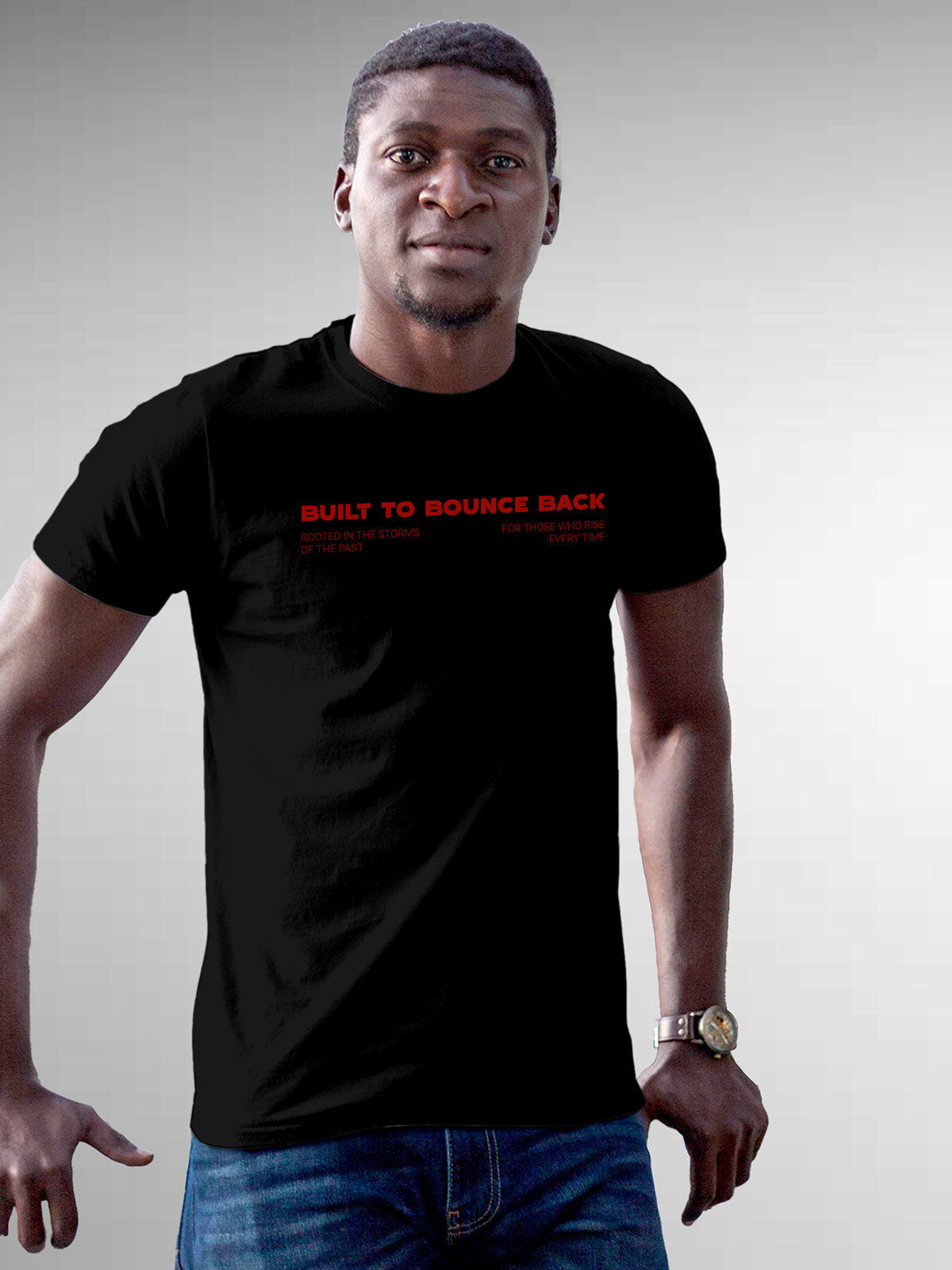 Model wearing Men's Black Round Neck T-shirt with 'Built To Bounce Back' design, offering effortless style and premium comfort