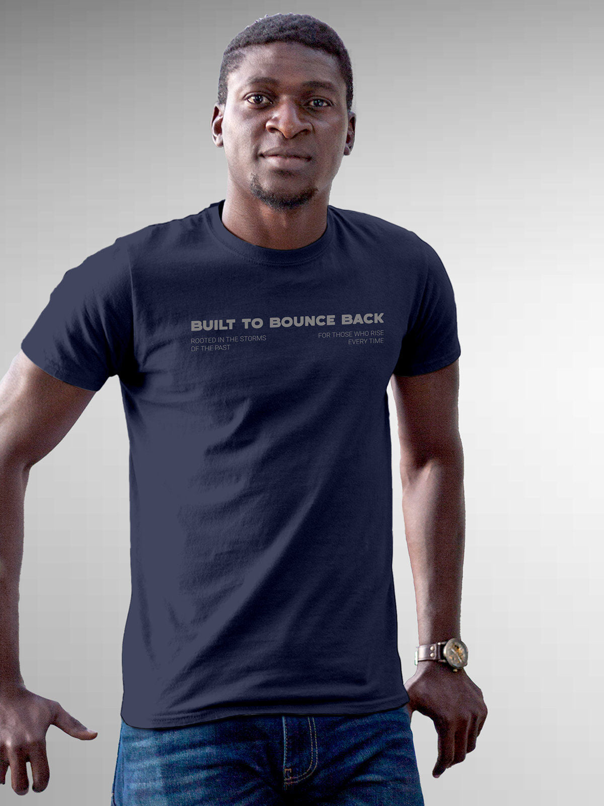 Model wearing Men's Navy Blue Round Neck T-shirt with 'Built To Bounce Back' design, offering effortless style and premium comfort