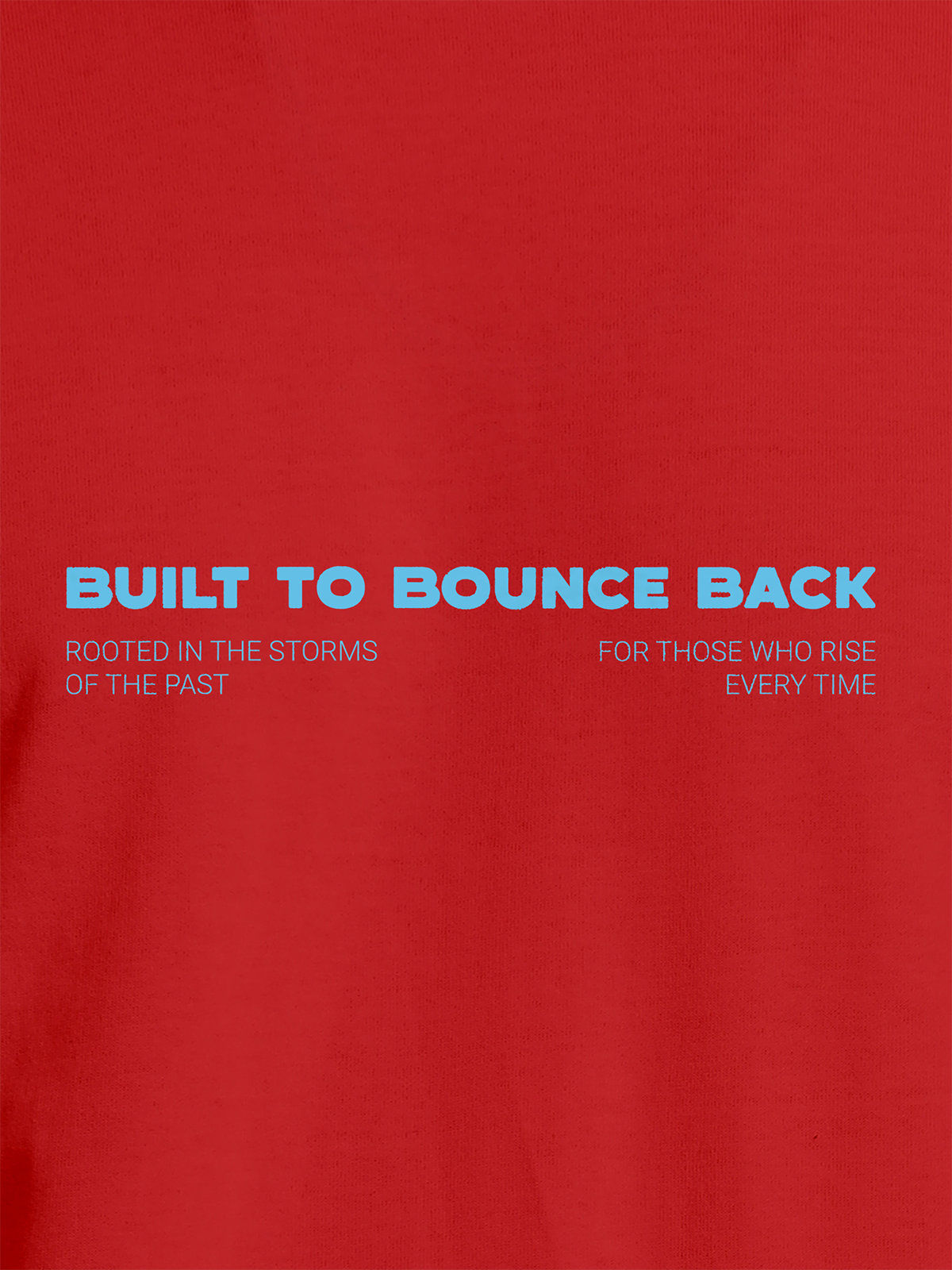 Close up of 'Built To Bounce Back' design on Men's Red Round Neck T-shirt, highlighting intricate details and vibrant print.
