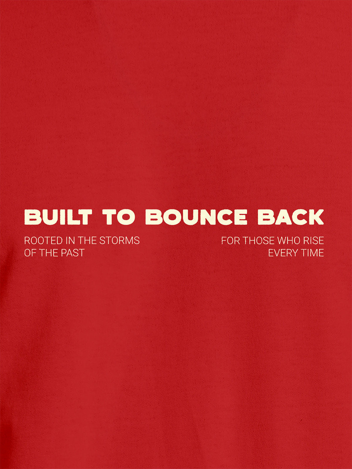Close up of 'Built To Bounce Back' design on Men's Red Round Neck T-shirt, highlighting intricate details and vibrant print.