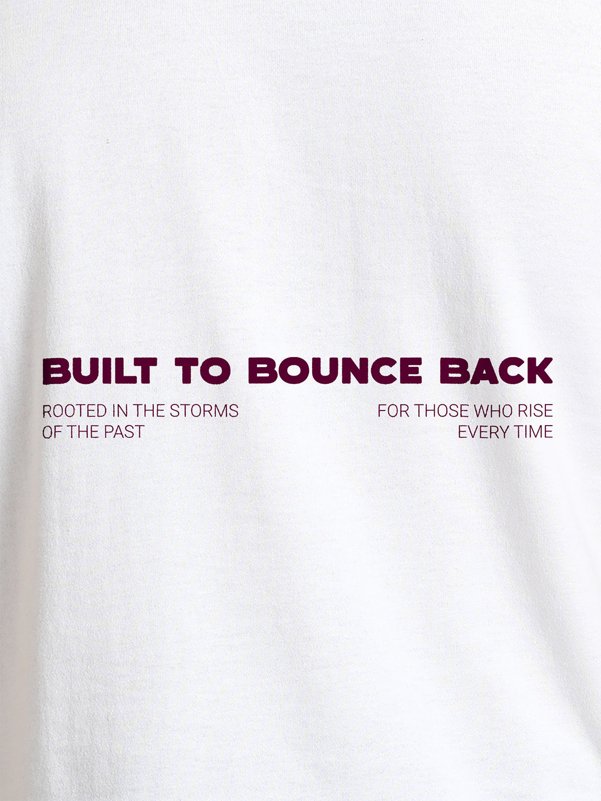 Close up of 'Built To Bounce Back' design on Women's White Round Neck T-shirt, highlighting intricate details and vibrant print.