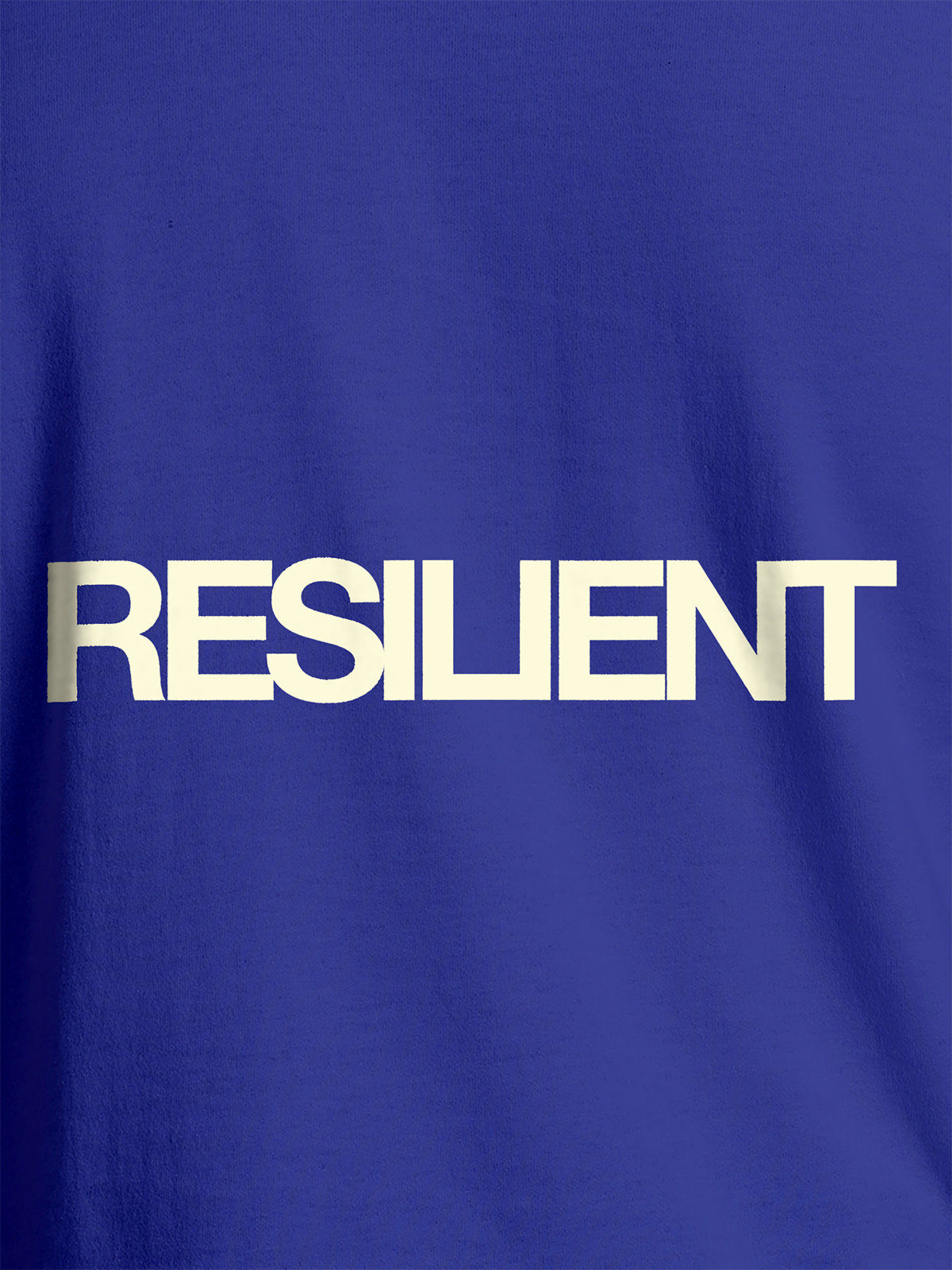 Close up of 'Resilient' design on Men's Blue Round Neck T-shirt, highlighting intricate details and vibrant print.
