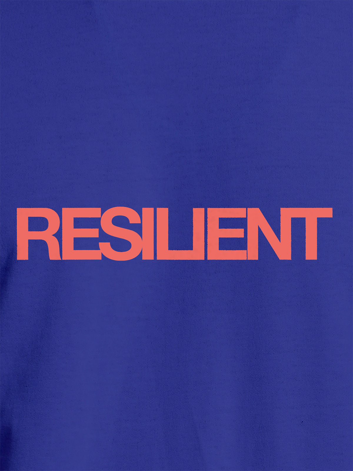 Close up of 'Resilient' design on Women's Blue Round Neck T-shirt, highlighting intricate details and vibrant print.