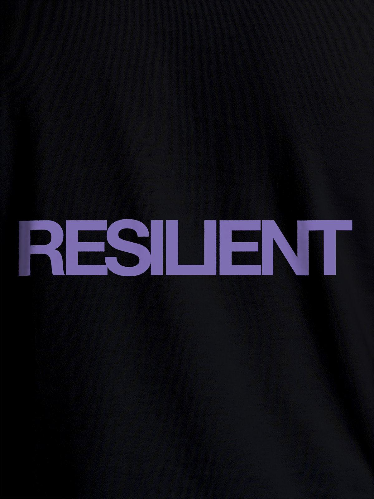 Close up of 'Resilient' design on Men's Black Round Neck T-shirt, highlighting intricate details and vibrant print.