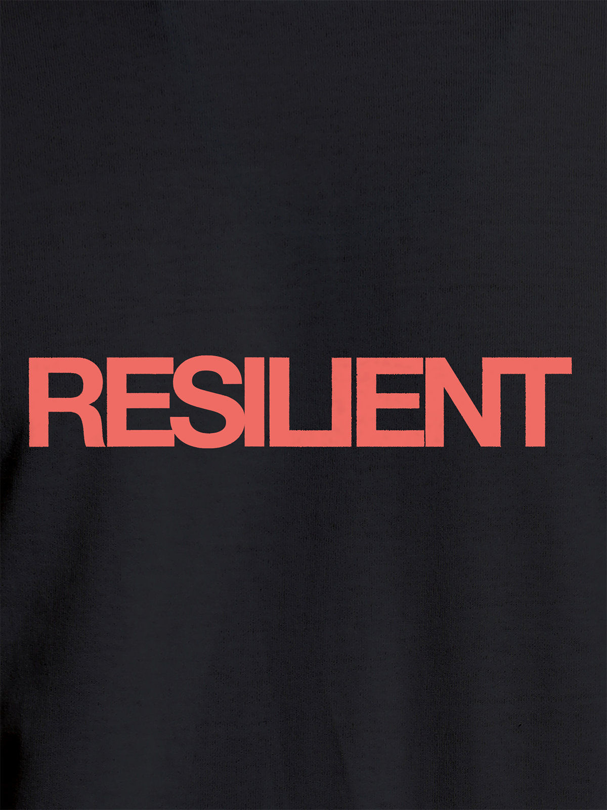 Close up of 'Resilient' design on Women's Dark Grey Round Neck T-shirt, highlighting intricate details and vibrant print.