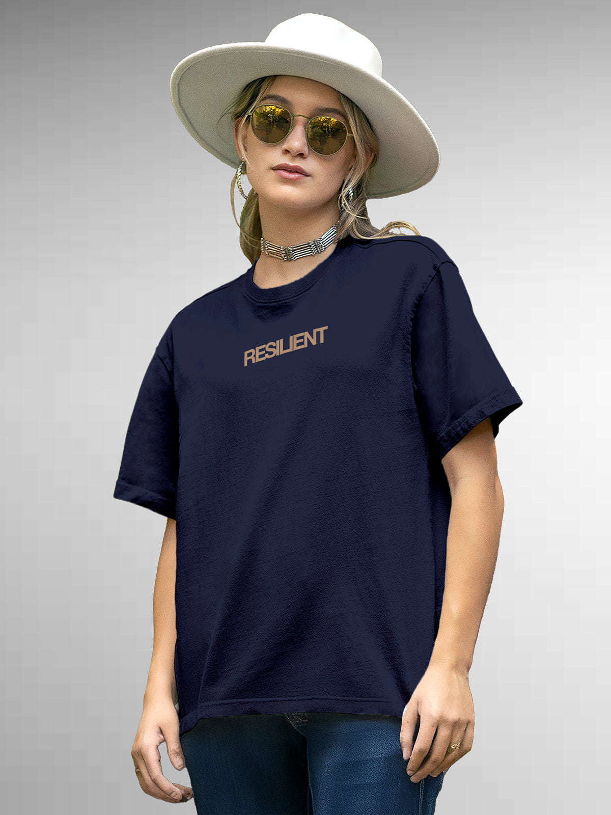 Model wearing Women's Navy Blue Round Neck T-shirt with 'Resilient' design, offering effortless style and premium comfort