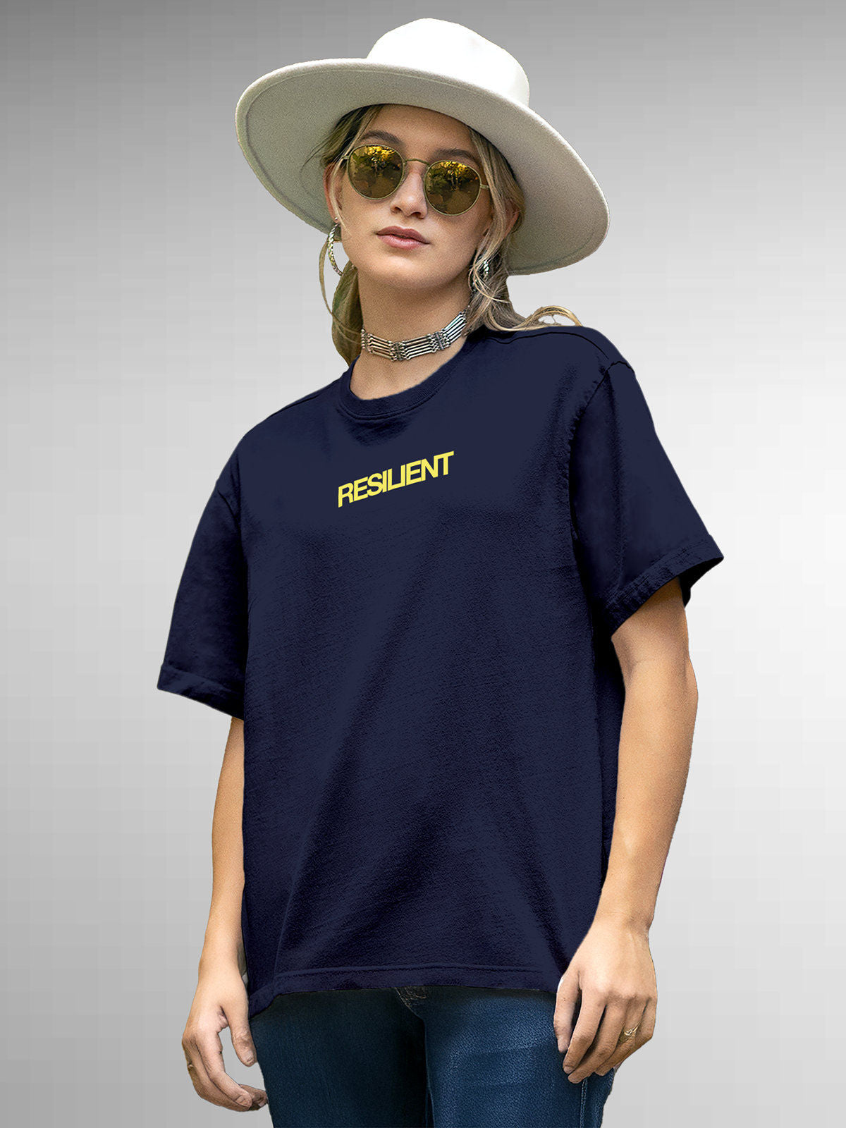 Model wearing Women's Navy Blue Round Neck T-shirt with 'Resilient' design, offering effortless style and premium comfort