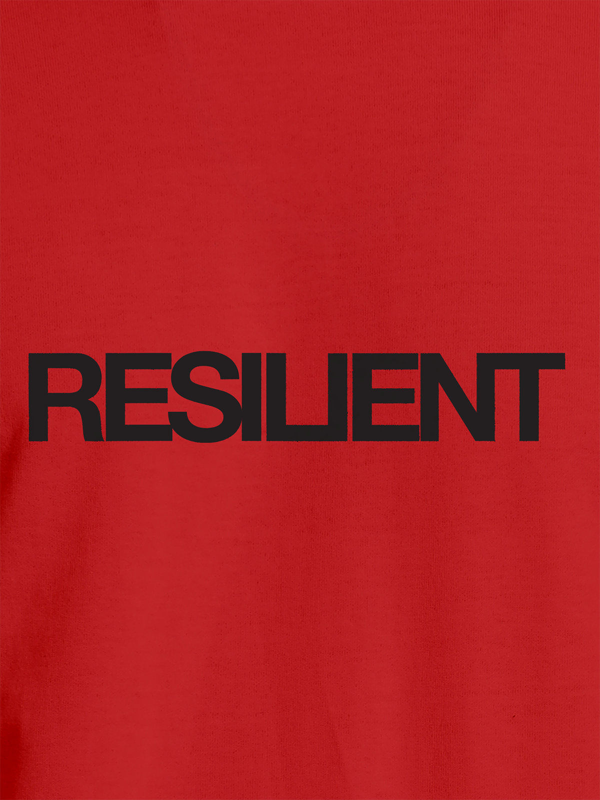 Close up of 'Resilient' design on Women's Red Round Neck T-shirt, highlighting intricate details and vibrant print.