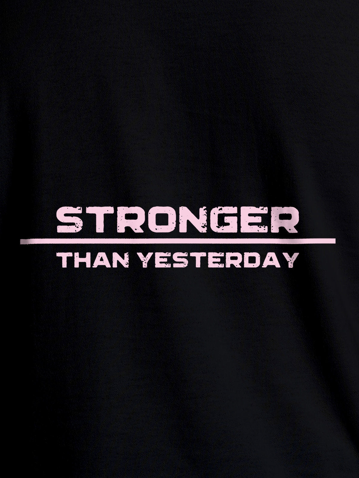Close up of 'Stronger Than Yesterday' design on Men's Black Round Neck T-shirt, highlighting intricate details and vibrant print.