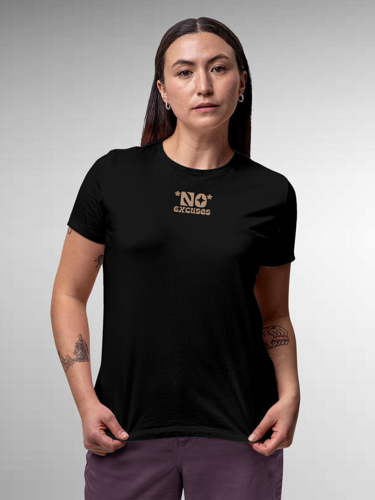 Model wearing Women's Black Round Neck T-shirt with 'No Excuses' design, offering effortless style and premium comfort