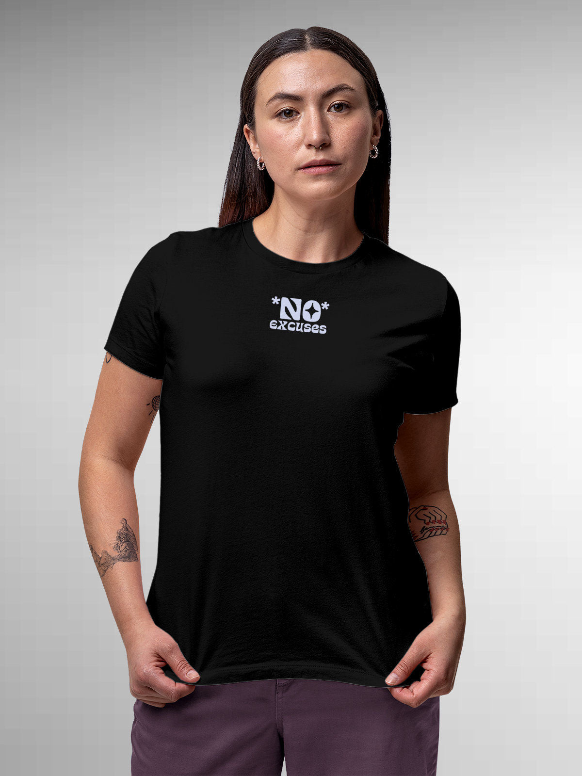 Model wearing Women's Black Round Neck T-shirt with 'No Excuses' design, offering effortless style and premium comfort