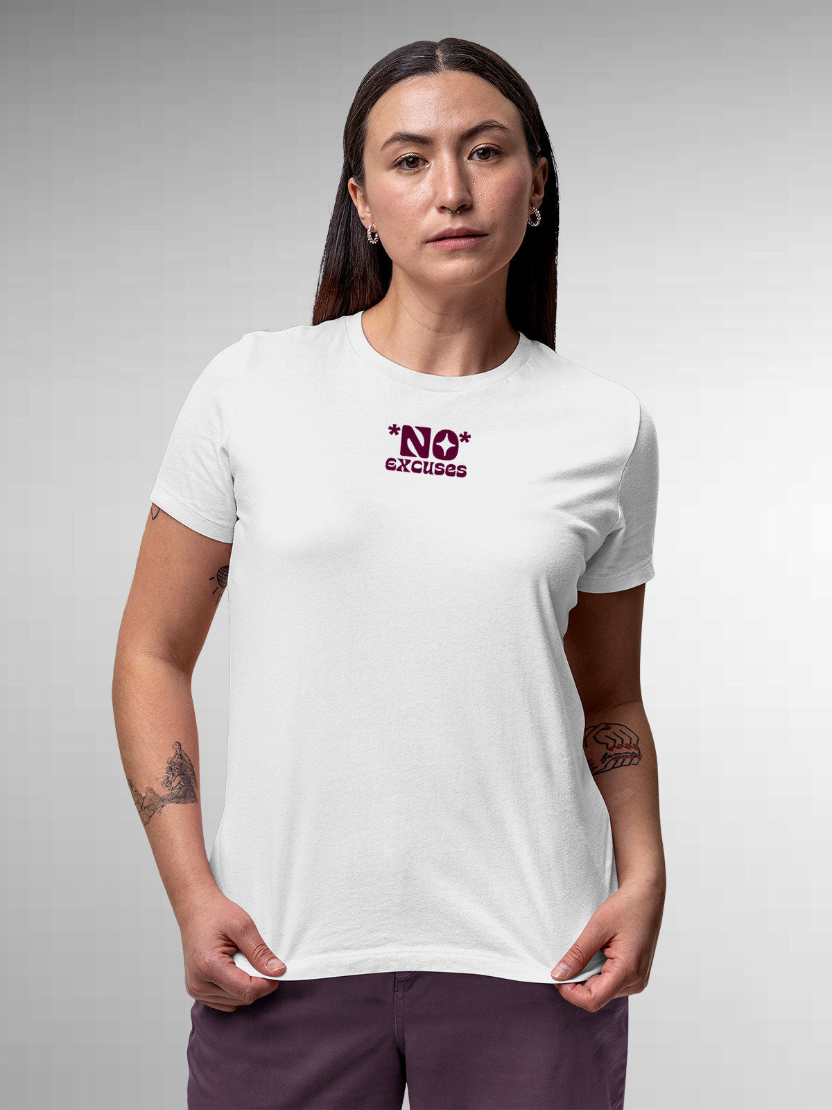 Model wearing Women's White Round Neck T-shirt with 'No Excuses' design, offering effortless style and premium comfort